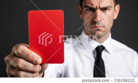 Man shows bright red card with stern expression - ai generated 136298222