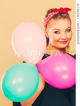 Happy smiling woman with balloons. Happy smiling woman with balloons. 136299155