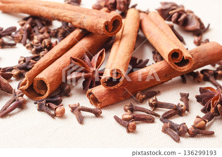 Spices cinnamon sticks anise stars and cloves 136299193