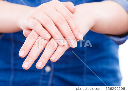 Woman presents hands nails. 136299206