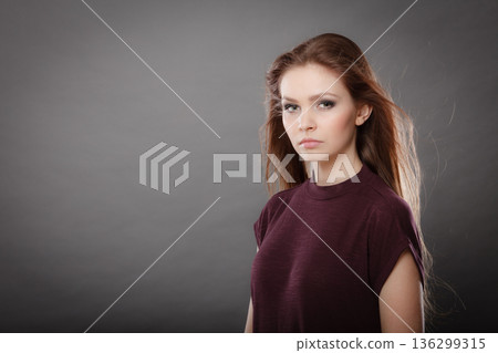 Glamorous stunning woman with waving hair. Glamorous stunning woman with waving hair. 136299315