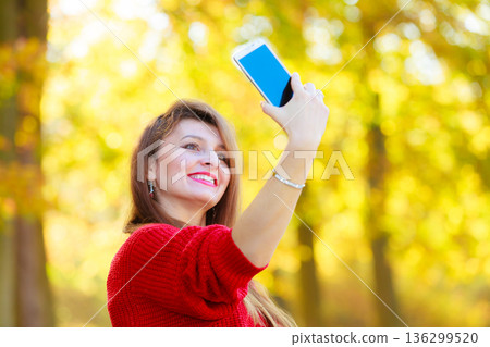 Gorgeous girl taking selfie. Gorgeous girl taking selfie. 136299520