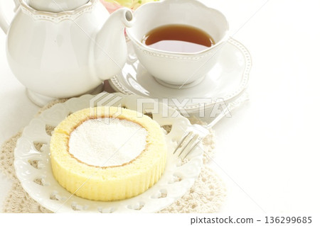 Snack roll cake and tea 136299685