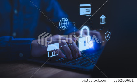 Person using a laptop computer with glowing lock and fintech icons, symbolizing cybersecurity, online banking protection, secure payment, data privacy, financial safety, and internet security concept. Person using a laptop computer with glowing lock and fintech icons, symbolizing cybersecurity, online banking protection, secure payment, data privacy, financial safety, and internet security concept. 136299691