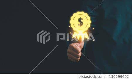 Businessman holding glowing golden award badge with dollar symbol, representing financial success, profit achievement, investment reward, and recognition for outstanding business performance. Businessman holding glowing golden award badge with dollar symbol, representing financial success, profit achievement, investment reward, and recognition for outstanding business performance. 136299692