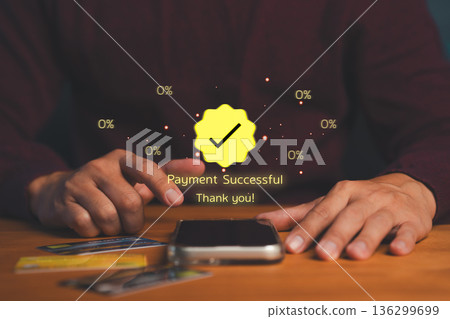 Close-up of hands using smartphone for online payment with digital confirmation message Payment Successful, representing fintech, mobile banking, cashless transaction, and secure digital finance. Close-up of hands using smartphone for online payment with digital confirmation message Payment Successful, representing fintech, mobile banking, cashless transaction, and secure digital finance. 136299699