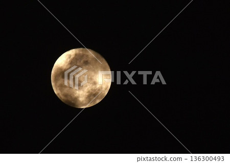 full moon covering by cloud floating on sky in night background 136300493