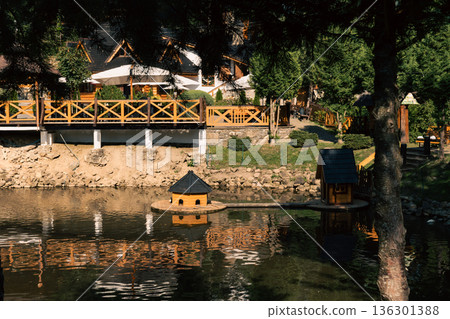 Wooden Lakeside Restaurant Terrace in Mountain Resort 136301388