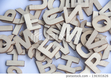 Top view of wooden letters on white background. 136301626