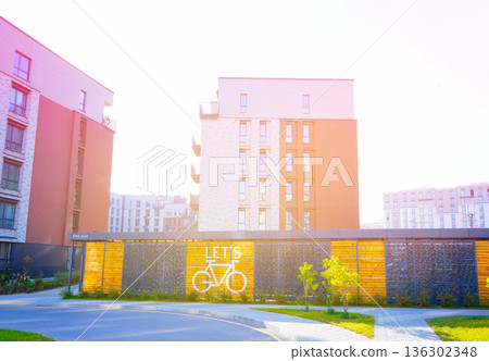 Bicycle parking in residential area at modern apartment buildings. Bicycle storage hangar  136302348