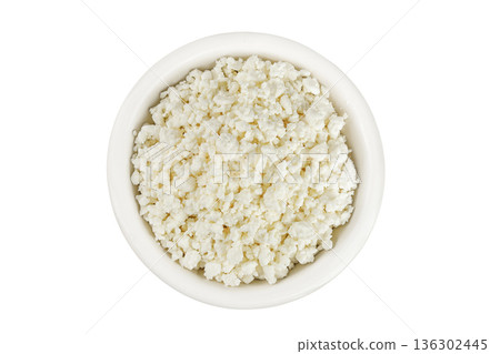 Cottage Cheese, Curd in ceramic bowl isolated on white background. Top view. Flat lay 136302445