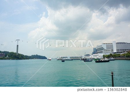 A view of the ropeway connecting Sentosa Island with mainland Singapore A view of the ropeway connecting Sentosa Island with mainland Singapore 136302848