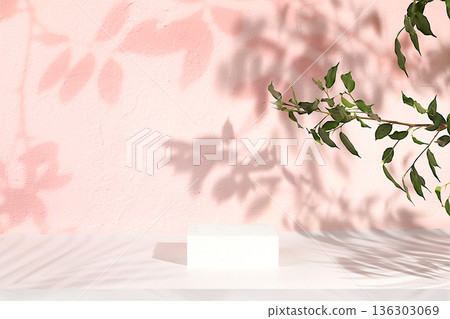 Premium empty podium with shadows of tropical palm leaves on sunny wall, minimal abstract background for cosmetics product presentation, design template, podium on pedestal, selective focus. Premium empty podium with shadows of tropical palm leaves on sunny wall, minimal abstract background for cosmetics product presentation, design template, podium on pedestal, selective focus. 136303069