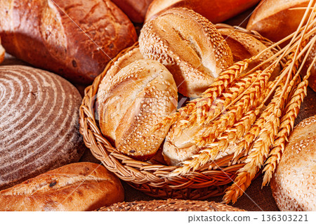 Fresh baked bread. Assorted bakery products loafs of bread and rolls... Fresh baked bread. Assorted bakery products loafs of bread and rolls... 136303221
