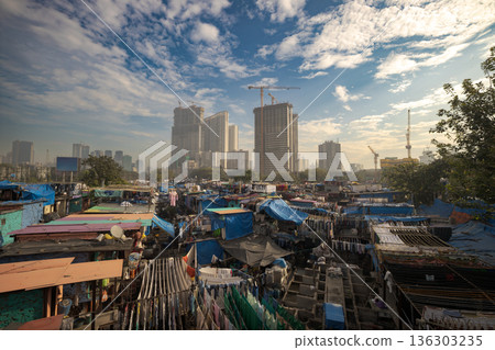 Contrast of Mumbai skyscrapers and Dhobi Ghat laundry. Contrast of Mumbai skyscrapers and Dhobi Ghat laundry. 136303235