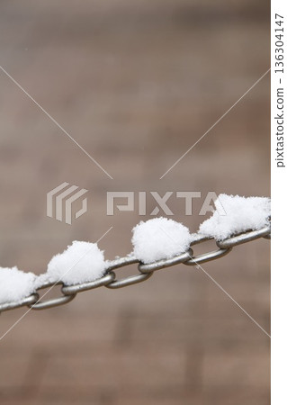 Snow-covered chains Snow-covered chains 136304147