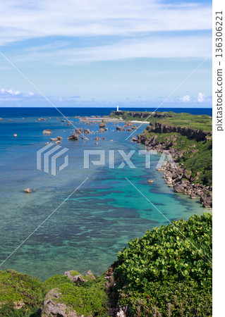 The emerald green sea and lighthouse at Higashi-Hennazaki in Miyako Island The emerald green sea and lighthouse at Higashi-Hennazaki in Miyako Island 136306221
