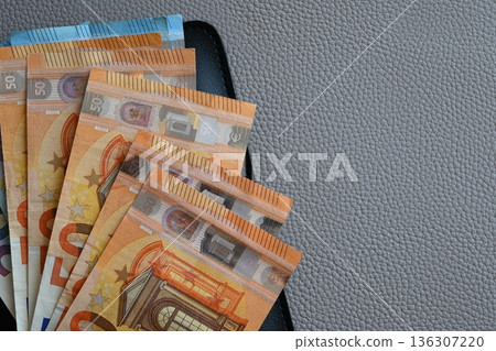 Partmone with euro money. Paper bills in leather wallet for commerce concept. Partmone with euro money. Paper bills in leather wallet for commerce concept. 136307220
