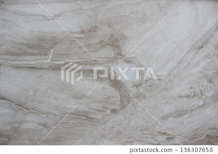 Grey Travertine marble texture with natural streaks forming cloud patterns and beautiful sedimentary rock grains. 136307658