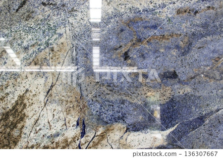 Azul Bahia blue marble texture with beige and black veins. This exotic granite from Brazil features luxury crystal patterns for interior design. 136307667