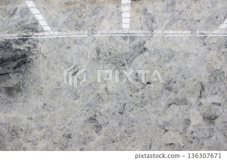 Bianco Antico white marble texture with gray and black mineral spots. This Brazilian granite is very popular for kitchen countertops and interiors. Bianco Antico white marble texture with gray and black mineral spots. This Brazilian granite is very popular for kitchen countertops and interiors. 136307671