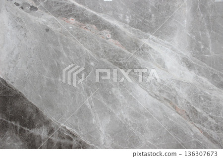 Grigio Billiemi gray marble texture with white diagonal veins and slight red hues. This stone from Sicily features a modern and dynamic look. Grigio Billiemi gray marble texture with white diagonal veins and slight red hues. This stone from Sicily features a modern and dynamic look. 136307673