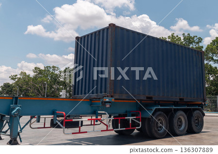 Trucking, Import, Export, Logistics, Industry with beautiful sky and Car Park background. Trucking, Import, Export, Logistics, Industry with beautiful sky and Car Park background. 136307889