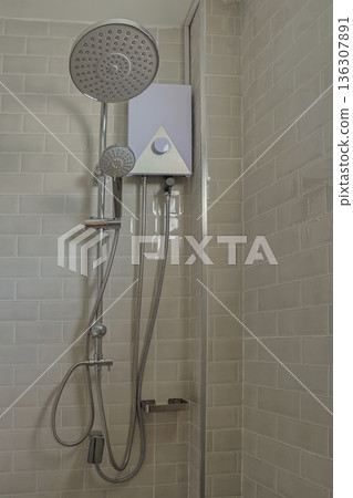 Shower at bathroom. Bathroom interior with shower stall and soap Gel bottle. 136307891