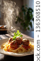spaghetti meatballs garnished with parsley 136308510
