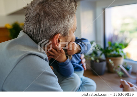 Little toddler giving kiss to father. Little toddler giving kiss to father. 136309839
