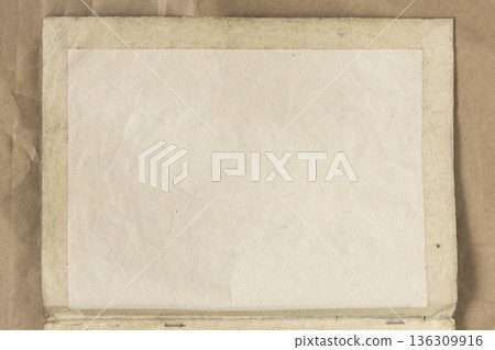Blank aged paper sheet with fabric border and visible texture placed on brown surface. Natural background for design, document layout, Template Base Blank aged paper sheet with fabric border and visible texture placed on brown surface. Natural background for design, document layout, Template Base 136309916