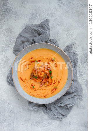 pumpkin cream soup with shrimp, herbs and spices, homemade, no people, 136310547