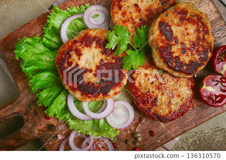 fried chicken cutlets, minced chicken, with vegetables, on a cutting board, with vegetable salad, top view, homemade, no people, fried chicken cutlets, minced chicken, with vegetables, on a cutting board, with vegetable salad, top view, homemade, no people, 136310570