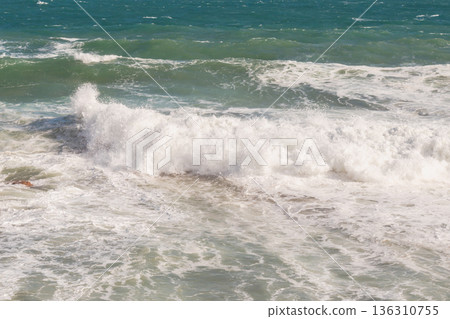 Natural marine background of stormy sea surface, powerful waves and white foam. 136310755
