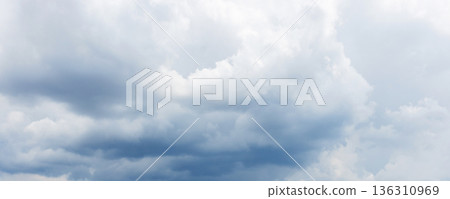 Panoramic view of sky with stormy gray clouds Panoramic view of sky with stormy gray clouds 136310969