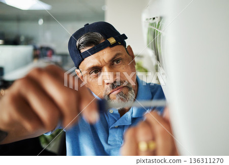 Electrician, engineering and air conditioner with man and screwdriver for maintenance, ventilation and power. Ac repair, electricity and inspection with technician and tools for fan and contractor Electrician, engineering and air conditioner with man and screwdriver for maintenance, ventilation and power. Ac repair, electricity and inspection with technician and tools for fan and contractor 136311270