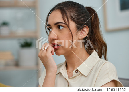 Biting, nails and woman with anxiety, stress and mental health risk at home. Scared, fear and face of nervous female person bite nail in panic, worry and thinking of depression, problem and bad habit Biting, nails and woman with anxiety, stress and mental health risk at home. Scared, fear and face of nervous female person bite nail in panic, worry and thinking of depression, problem and bad habit 136311332