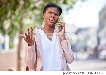 Phone call, frustrated and confused black woman employee angry at contact or bad news on mobile conversation. Street, city and young worker with stress talking about a fail project or mistake 136311442