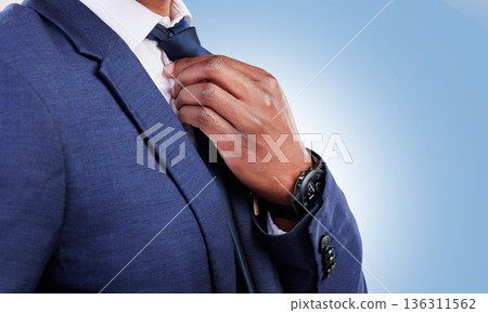 Business man, hands and fix tie for fashion, professional suit or corporate trader in studio with mockup space. Closeup of executive worker, salesman or CEO ready for job interview on blue background 136311562