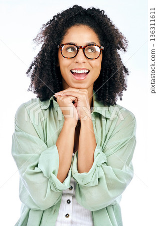 Thinking, smile and dream with a woman in studio isolated on a white background to wish or pray. Idea, hope and excited with a happy young female person looking or feeling positive in anticipation 136311611