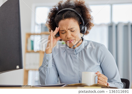 Customer support, call center and woman with crisis in office with tension, stress and headache. Telemarketing, crm service and overworked female person with burnout, frustrated and exhausted at desk Customer support, call center and woman with crisis in office with tension, stress and headache. Telemarketing, crm service and overworked female person with burnout, frustrated and exhausted at desk 136311691