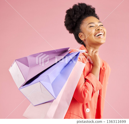African woman, studio and smile shopping bag with discount, sale and thinking by pink background. Young gen z girl, retail promotion and happy for deal, customer experience and fashion for gift idea African woman, studio and smile shopping bag with discount, sale and thinking by pink background. Young gen z girl, retail promotion and happy for deal, customer experience and fashion for gift idea 136311699