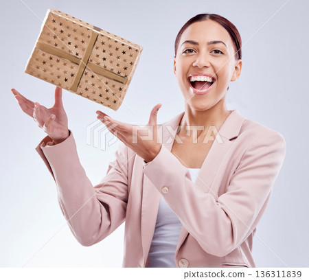 Gift, happy and portrait of business woman in studio for shopping, surprise and birthday celebration. Wow, giveaway and prize with face of person and box on white background for package and present Gift, happy and portrait of business woman in studio for shopping, surprise and birthday celebration. Wow, giveaway and prize with face of person and box on white background for package and present 136311839