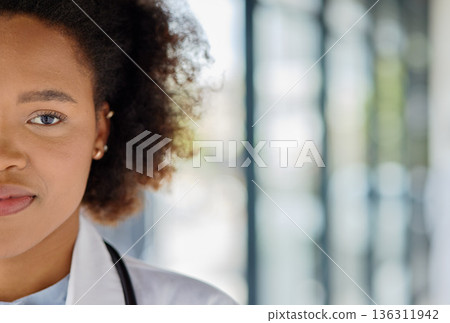 Portrait, half face and a black woman or doctor at a hospital with mockup for advertising. Healthcare, medicine and a young African nurse or surgeon with space for marketing at a clinic with bokeh Portrait, half face and a black woman or doctor at a hospital with mockup for advertising. Healthcare, medicine and a young African nurse or surgeon with space for marketing at a clinic with bokeh 136311942