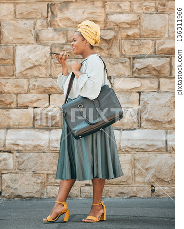 Voice note, city and business African woman for contact, networking and connection in urban town. Travel, corporate worker and female person on phone call for talking, conversation and communication 136311966