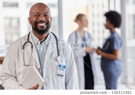 Smile, portrait and hospital doctor, black man or cardiologist team leader of healthcare trust, medical wellness and cardiology. Group leadership, tablet and African person for professional support Smile, portrait and hospital doctor, black man or cardiologist team leader of healthcare trust, medical wellness and cardiology. Group leadership, tablet and African person for professional support 136311981