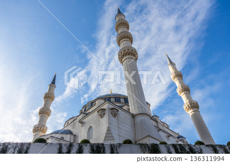 Large white Great Mosque building with minarets representing modern Islamic religious architecture with blue sky in the background, Tirana, Albania Large white Great Mosque building with minarets representing modern Islamic religious architecture with blue sky in the background, Tirana, Albania 136311994