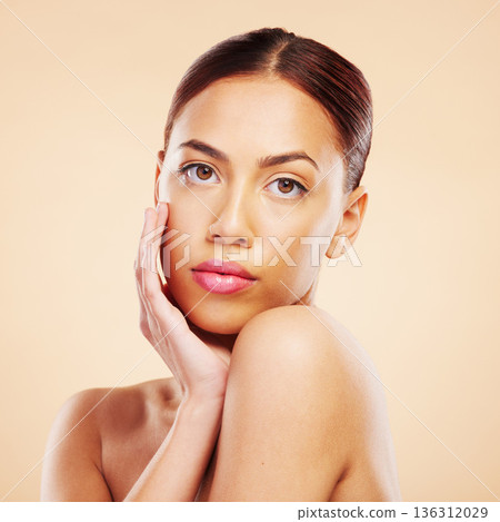 Portrait, beauty and woman with skincare, makeup and dermatology against a brown studio background. Face, female person or model with luxury, wellness and healthy skin with shine, glow and aesthetic Portrait, beauty and woman with skincare, makeup and dermatology against a brown studio background. Face, female person or model with luxury, wellness and healthy skin with shine, glow and aesthetic 136312029