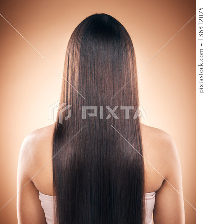 Back, straight hair and beauty of woman in studio isolated on a brown background. Haircare, natural cosmetics and model with salon treatment for balayage hairstyle, growth and aesthetic for wellness 136312075