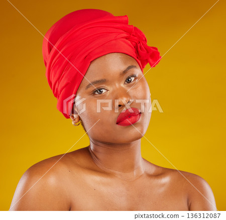 Natural beauty, hair wrap and portrait with scarf, red lipstick and wellness in studio. Yellow background, female person and face cosmetics with African model and makeup for skincare and facial glow Natural beauty, hair wrap and portrait with scarf, red lipstick and wellness in studio. Yellow background, female person and face cosmetics with African model and makeup for skincare and facial glow 136312087
